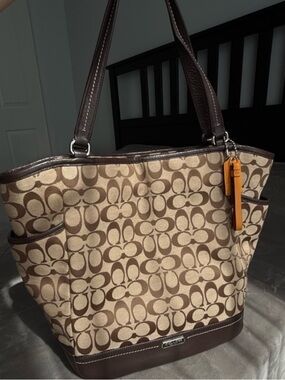 Coach Beige Signature Canvas Tote with Brown Trim and Orange Tag